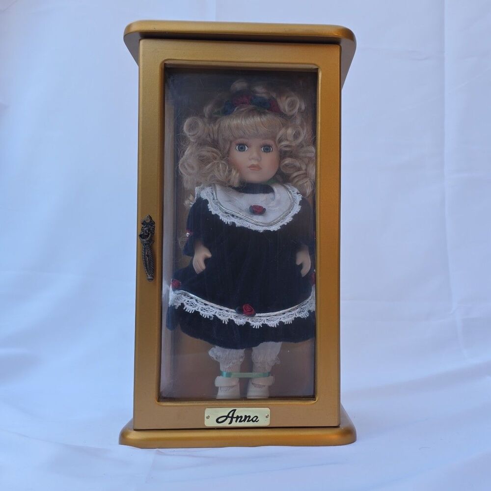 Heritage Signature Series collectible Anna porcelain doll in display case